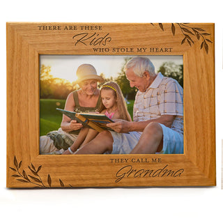 There are these kids who stole my heart, they call me Grandma - Engraved Natural Wood Photo Frame